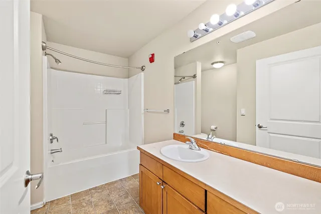 a bathroom with a shower and a toilet