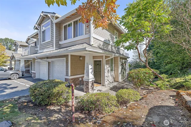 a view of a house with a yard