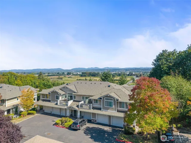 a view of lake and houses with outdoor space