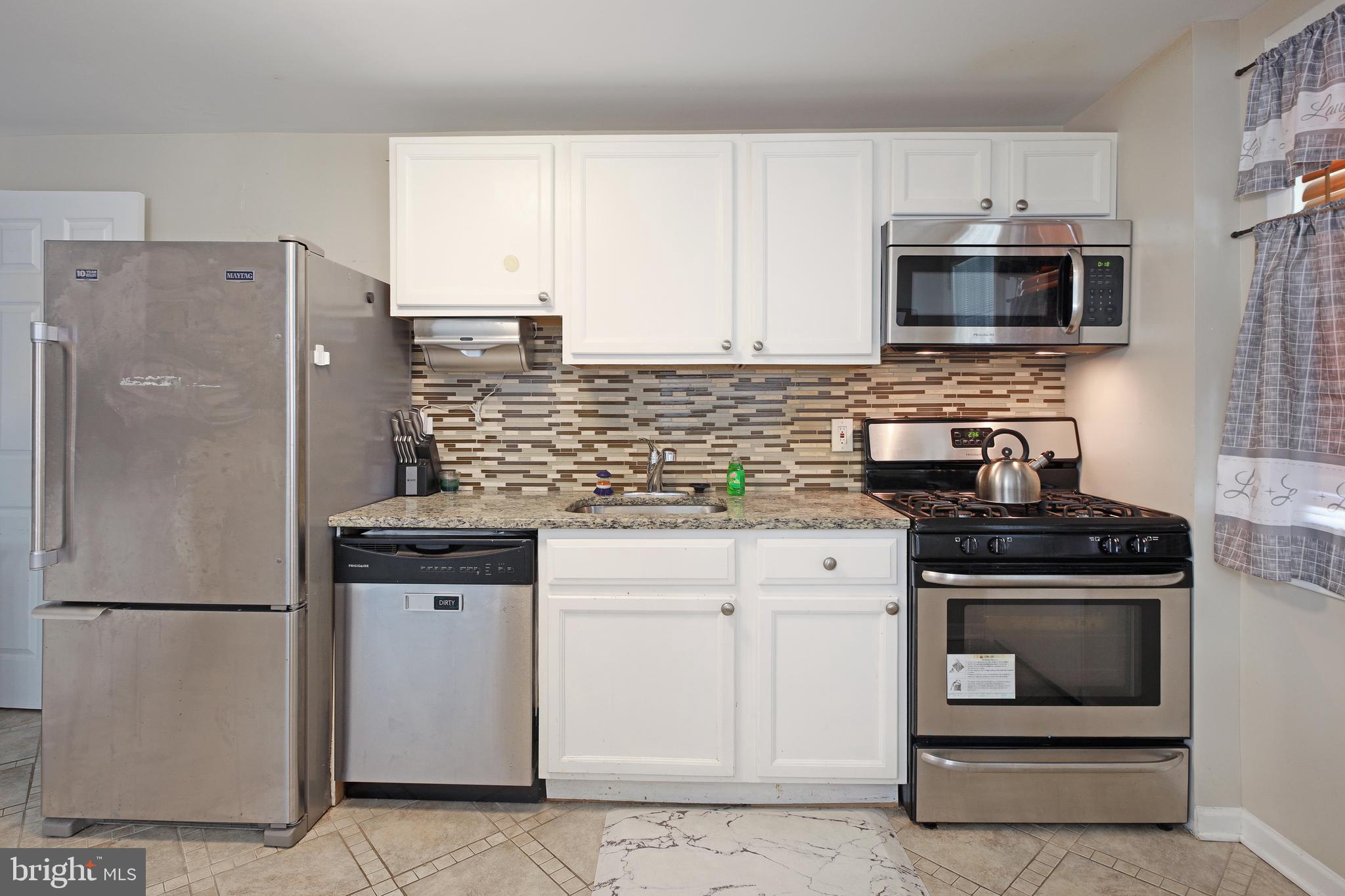 5541 Bucknell Road Baltimore, MD 21206 - Photo 8 of 23 Kitchen with stainless steel appliances!!!