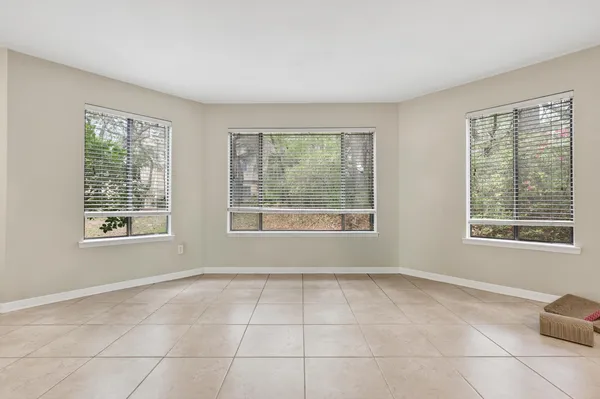 a view of a livingroom with furniture and a flat screen tv