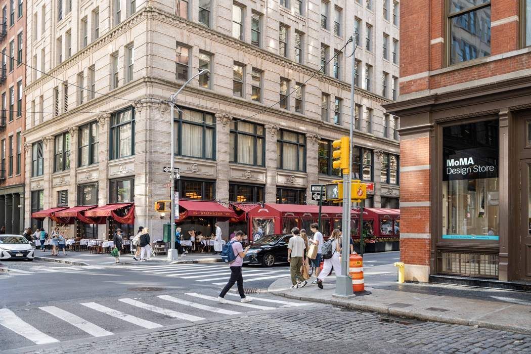 97 Crosby Street, Unit 1 Manhattan, NY 10012 - Photo 14 of 15 a view of a building with street