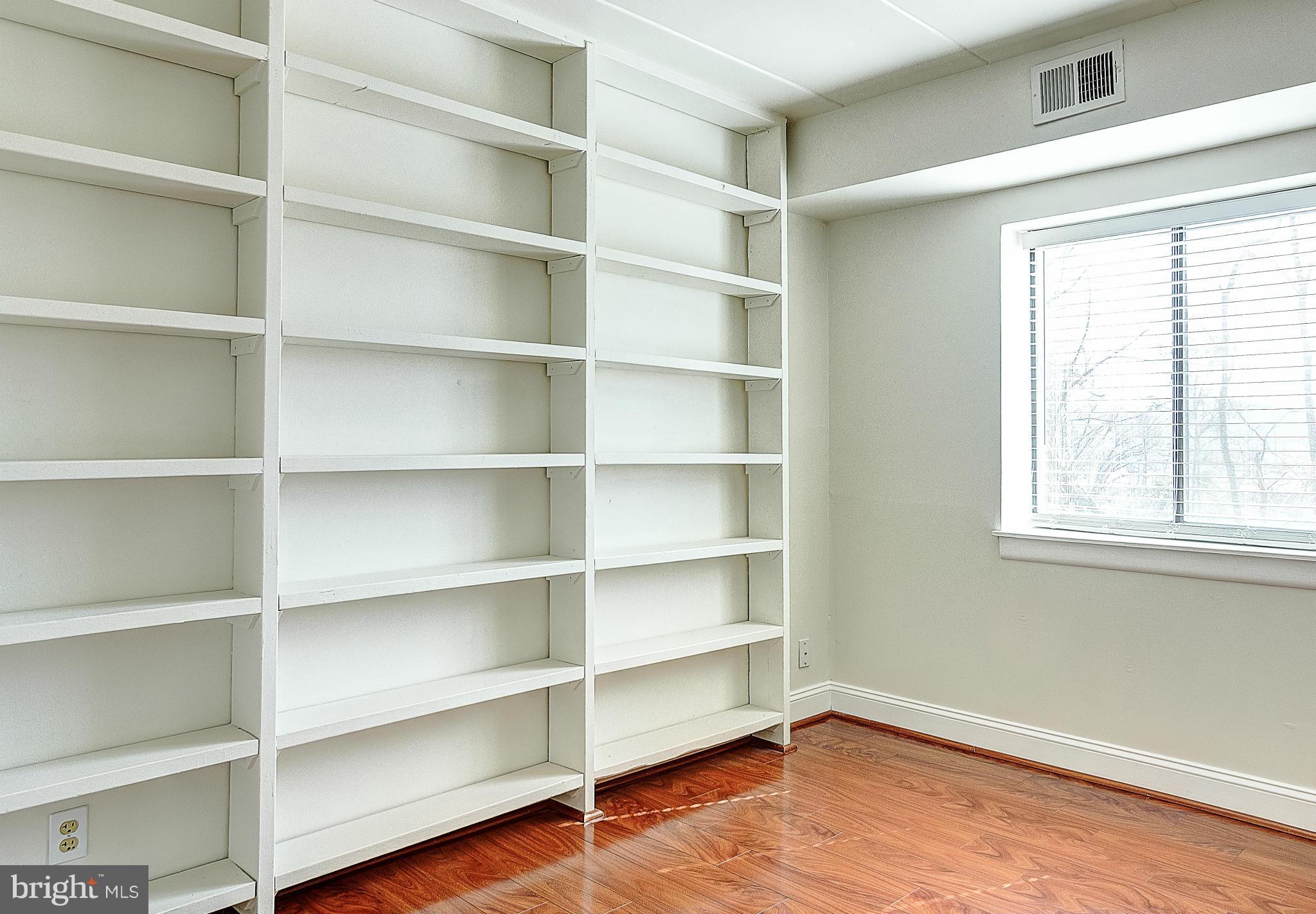6260 Edsall Road, Unit 101 Alexandria, VA 22312 - Photo 21 of 30 Second bedroom with built in shelves