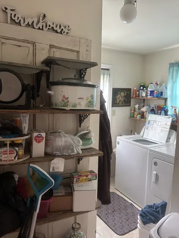 a kitchen with a stove and a refrigerator