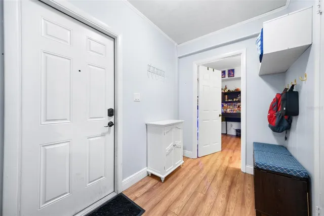 a bathroom with a granite countertop sink and a toilet
