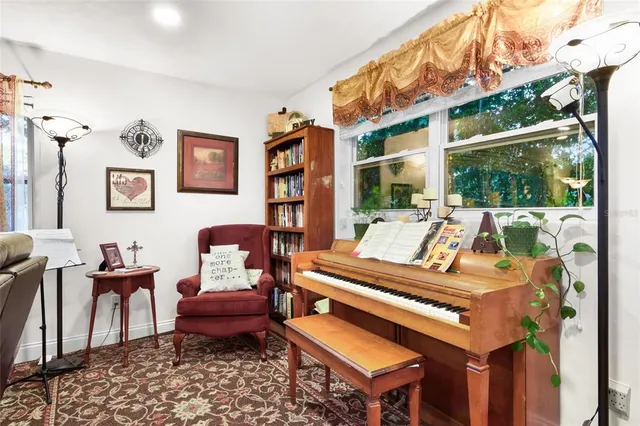 a living room with furniture and a window