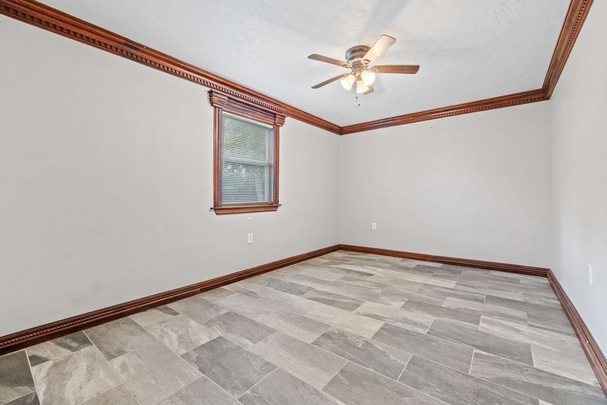 6742 Dusty Lane Conroe, TX 77306 - Photo 27 of 38 This space is located in the shop, it's very versatile. Use it for an extra guest suite/office/workout room, etc.