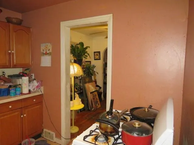 a bathroom with a toilet and a sink