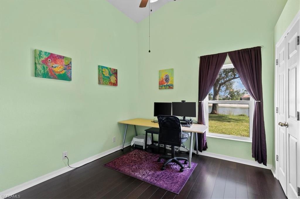 2806 Orange Grove Trail Naples, FL 34120 - Photo 13 of 24 a workspace with furniture and a window