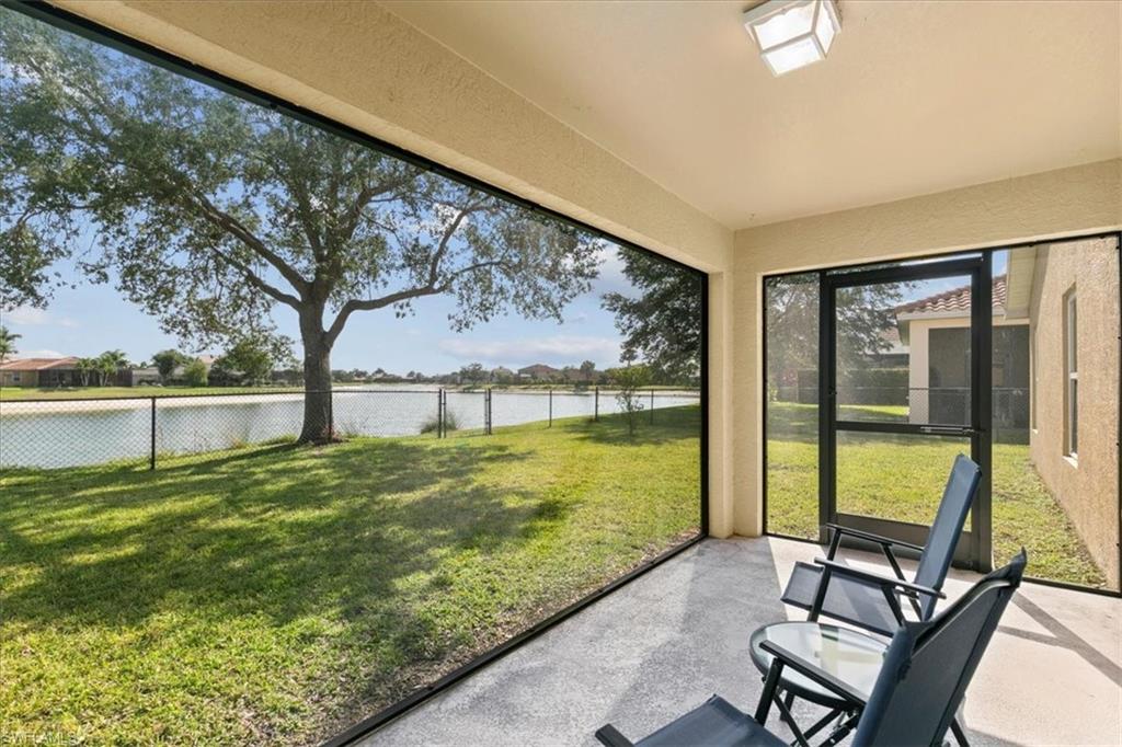 2806 Orange Grove Trail Naples, FL 34120 - Photo 15 of 24 a view of a chairs and table in the patio