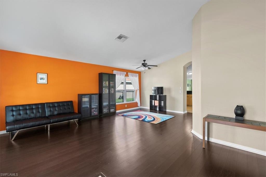 2806 Orange Grove Trail Naples, FL 34120 - Photo 3 of 24 a view of livingroom with furniture and floor to ceiling window