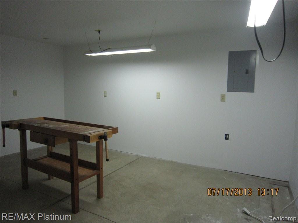4203 North Latson Road Howell, MI 48855 - Photo 25 of 34 LATSON RD HIS WORKSHOP
