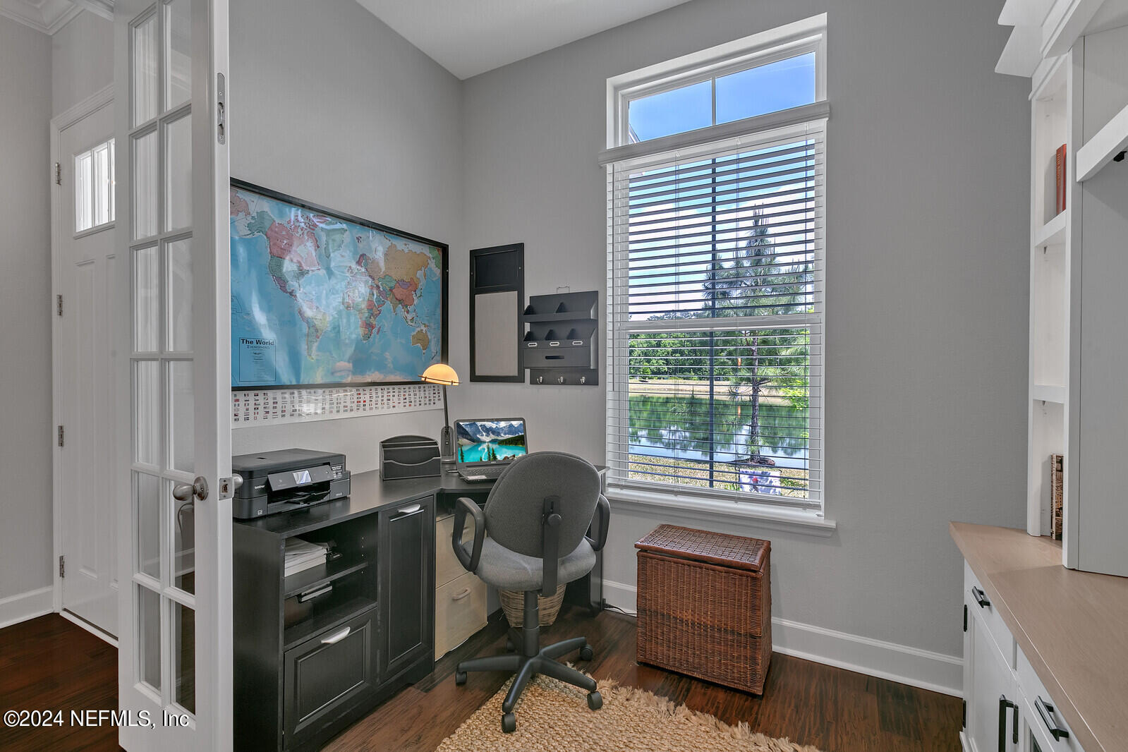 223 Chalet Ct Street St. Augustine, FL 32092 - Photo 11 of 45 a view of a workspace with furniture and a window
