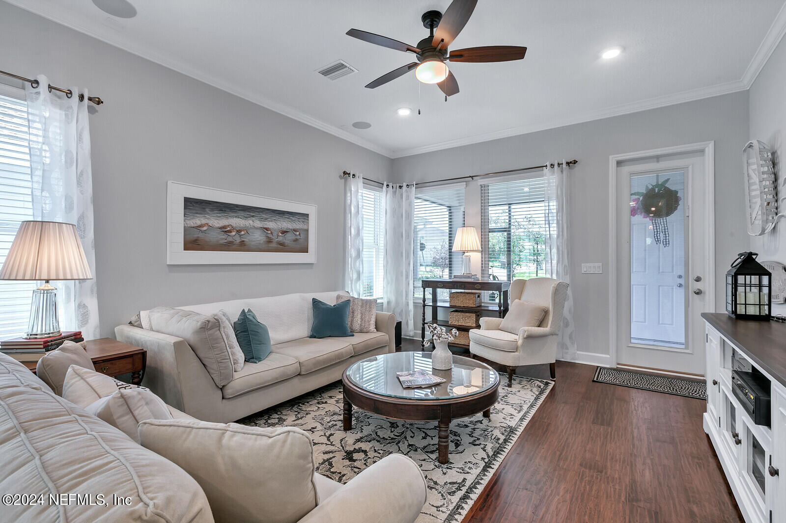 223 Chalet Ct Street St. Augustine, FL 32092 - Photo 14 of 45 a living room with furniture and a wooden floor