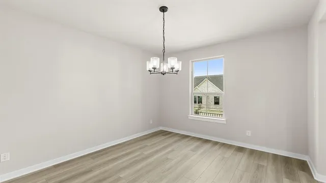 a view of an empty room with window