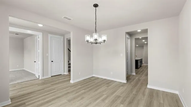 a view of a chandelier in a room