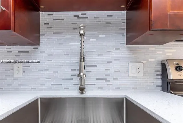 a close view of sink and mirror