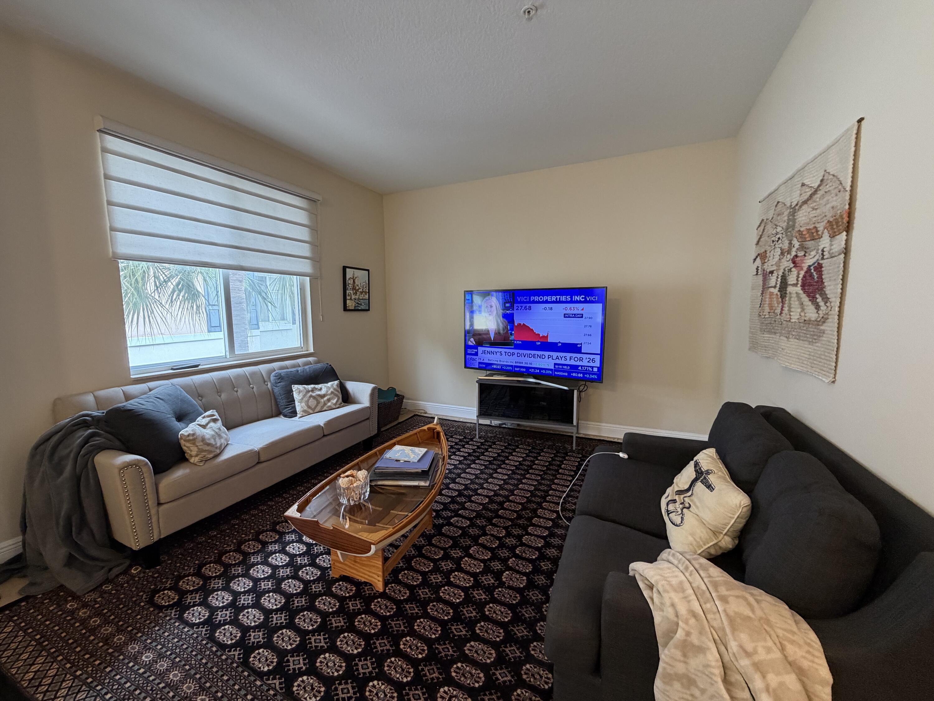 558 North West 39th Circle Boca Raton, FL 33431 - Photo 5 of 25 a living room with furniture and a window
