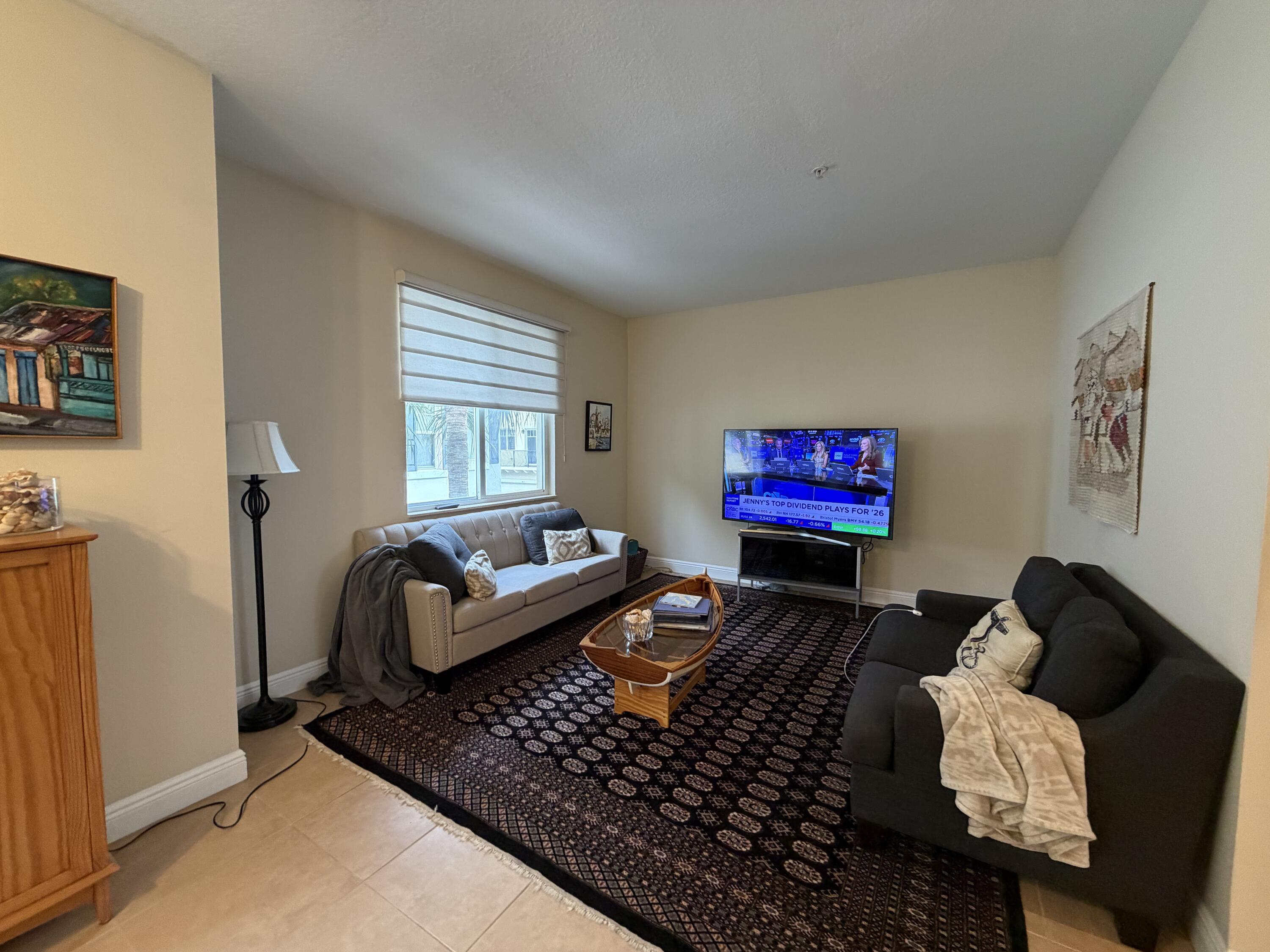 558 North West 39th Circle Boca Raton, FL 33431 - Photo 6 of 25 a living room with furniture and a rug