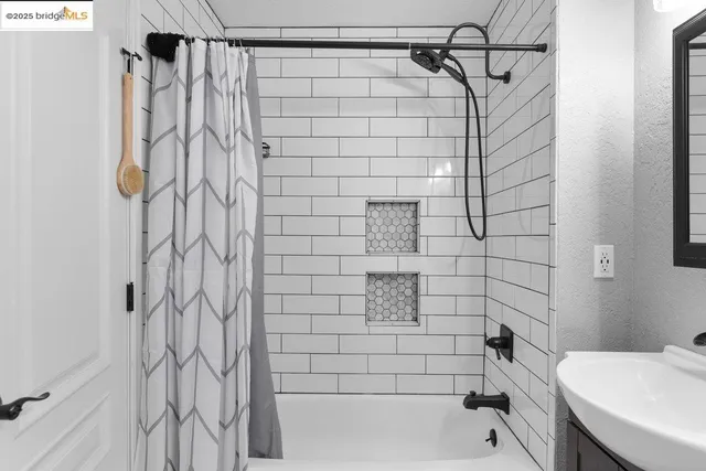 a bathroom with a shower and a toilet