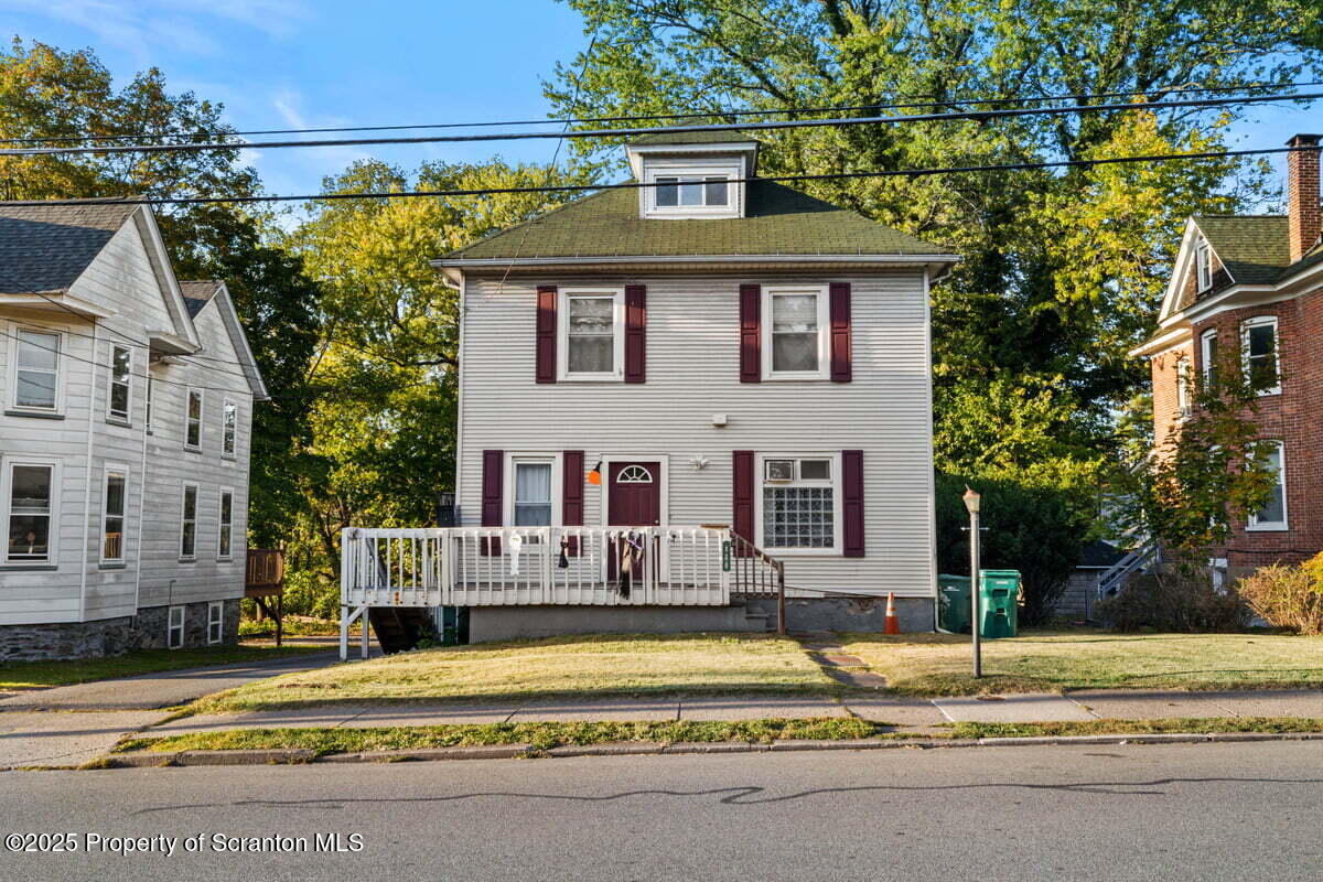 120 Ridgeway Street East Stroudsburg, PA 18301 - Photo 4 of 49 a house that has a tree in front of it