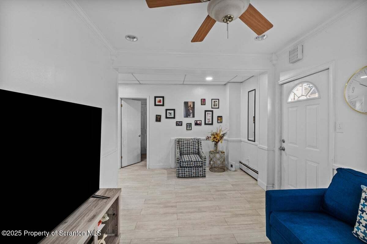 120 Ridgeway Street East Stroudsburg, PA 18301 - Photo 9 of 49 a living room with furniture and a flat screen tv