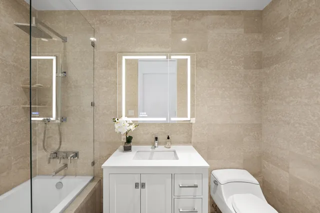 a bed room with a bed and a window