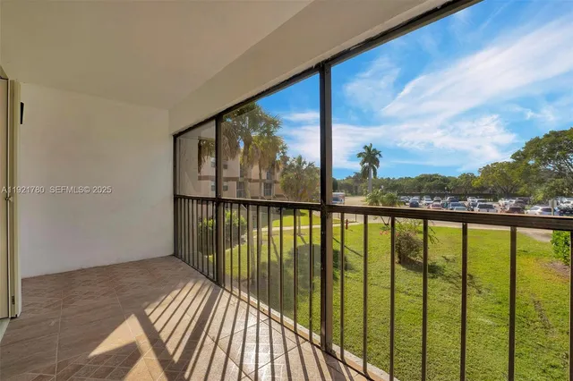 a view of a balcony with lake view
