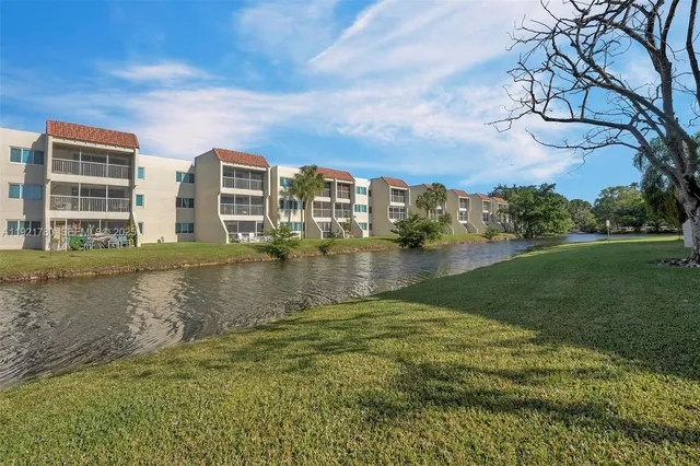 a view of a lake with a big yard