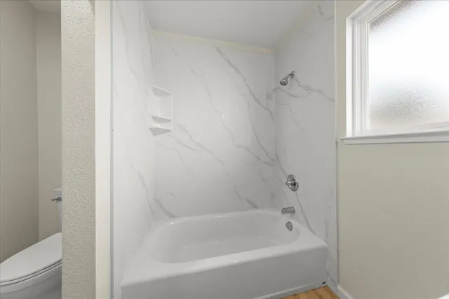 a bathroom with a bathtub