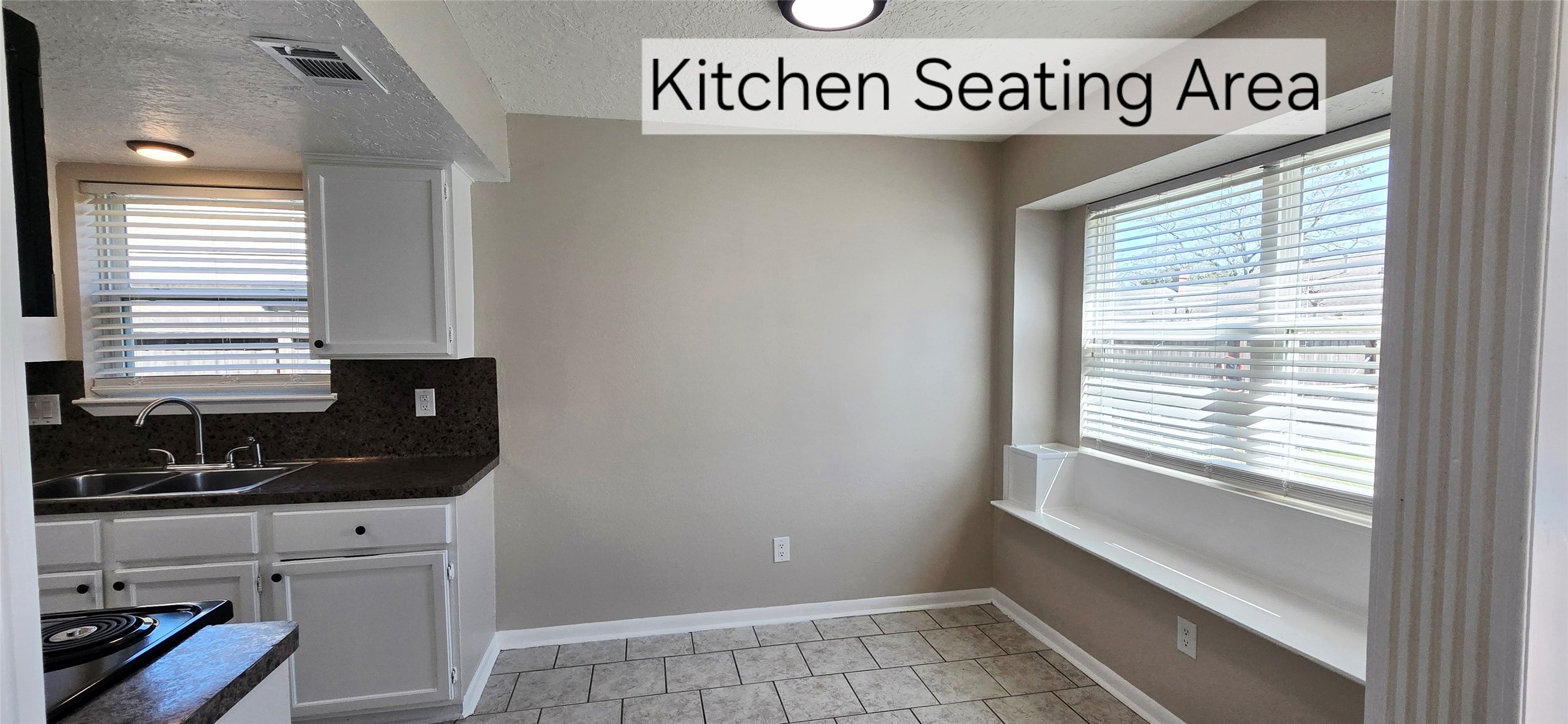 4827 Cypressdale Drive Spring, TX 77388 - Photo 12 of 35 a view of a kitchen that has a sink and window