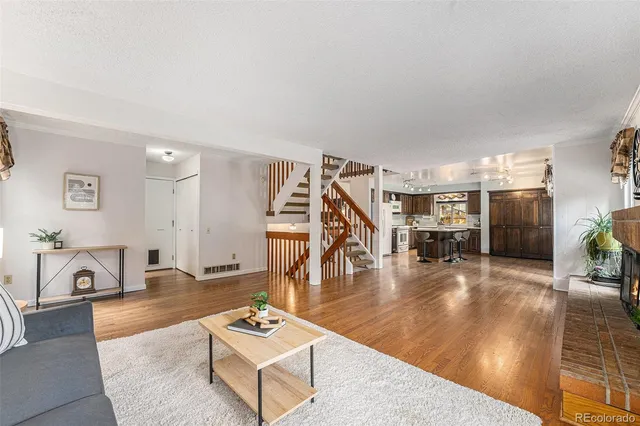 a living room with furniture and a table