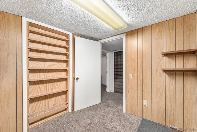 a view of front door with wooden floor