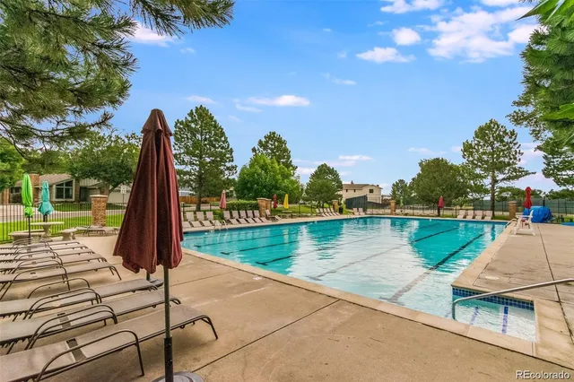 a view of a lake with a swimming pool