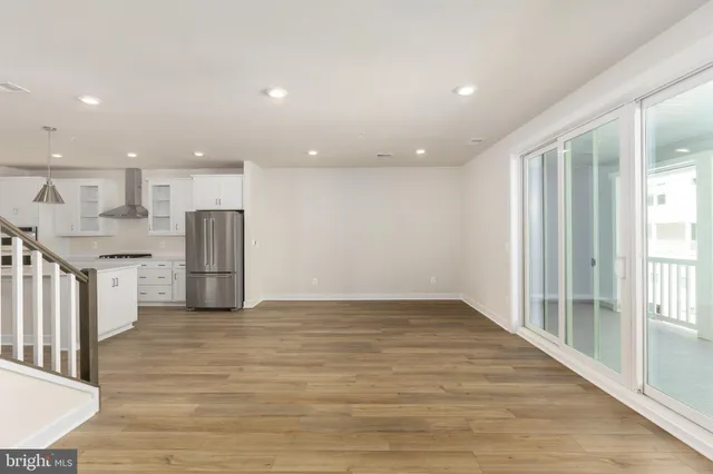a view of kitchen with wooden floor