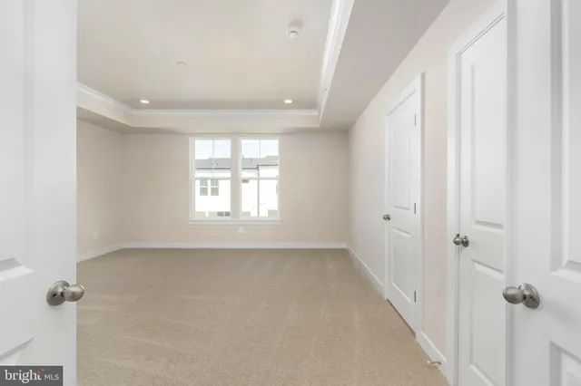 a bathroom with a double vanity sink and mirror