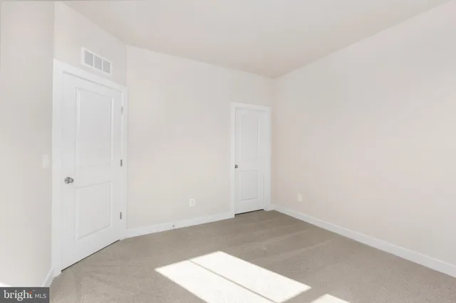 a bathroom with a sink a mirror and a shower