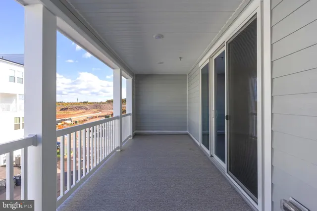 a front view of a building with street view