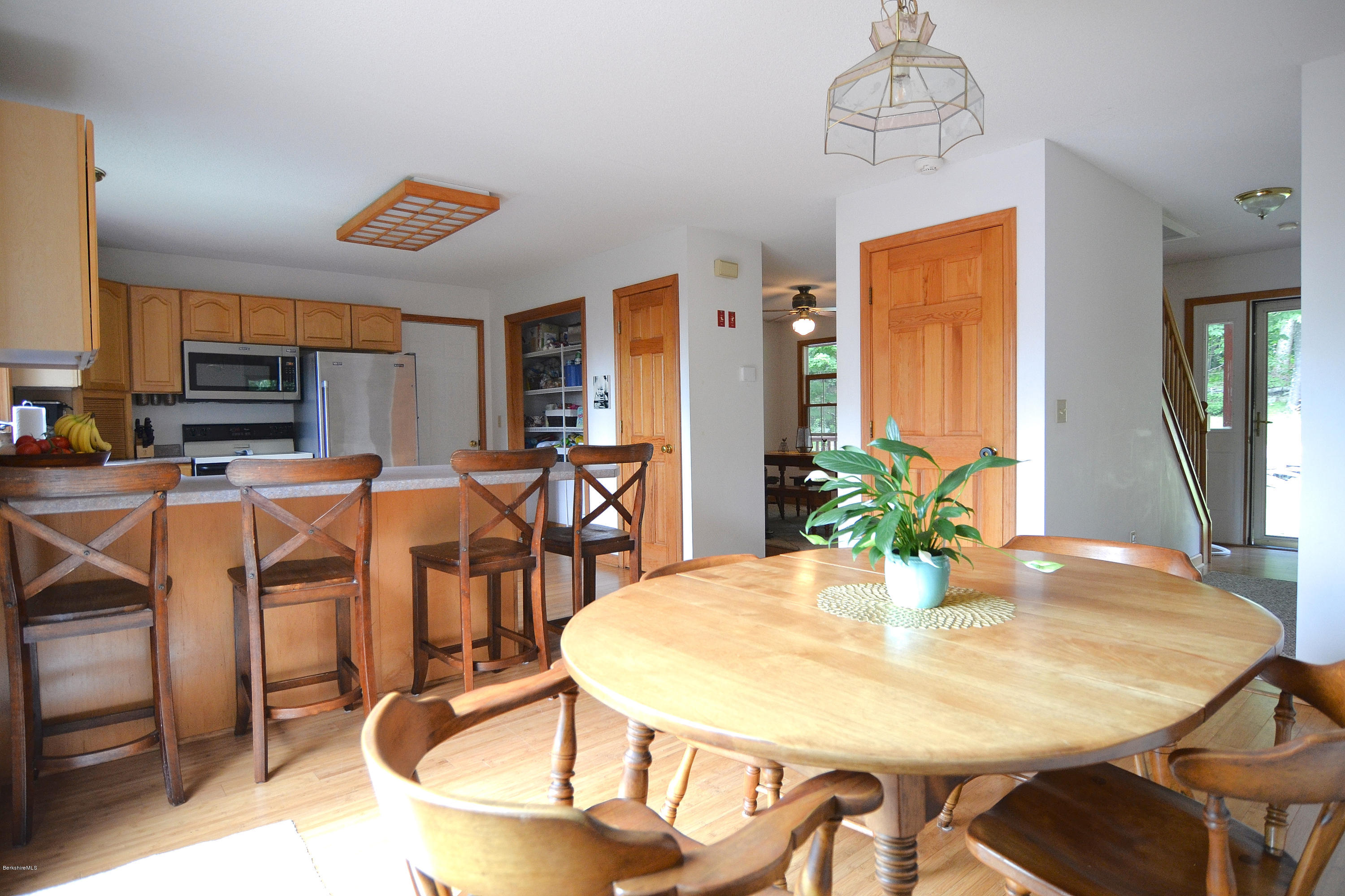 693 George Carter Road Becket, MA 01223 - Photo 10 of 36 a view of a dining room with furniture