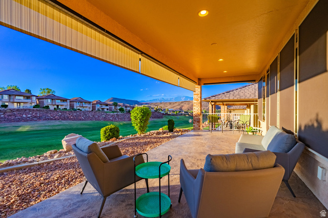 2212 Chippenham Court St. George, UT 84770 - Photo 27 of 75 View of patio with a residential view, outdoor seating, and a mountain view