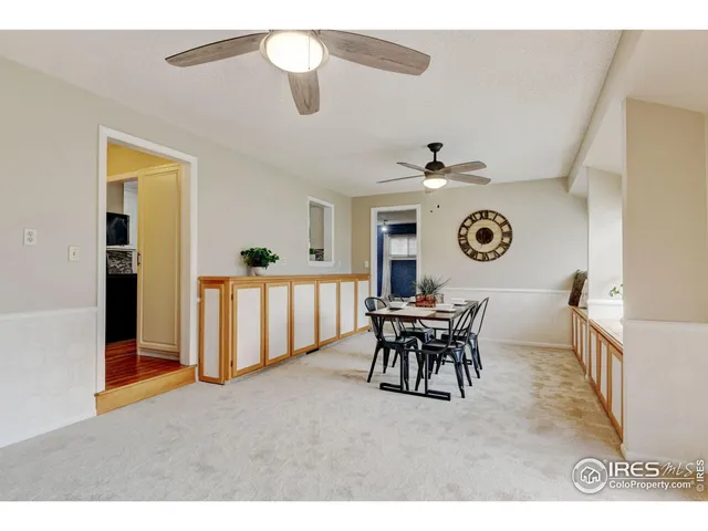 a view of a livingroom with furniture and window