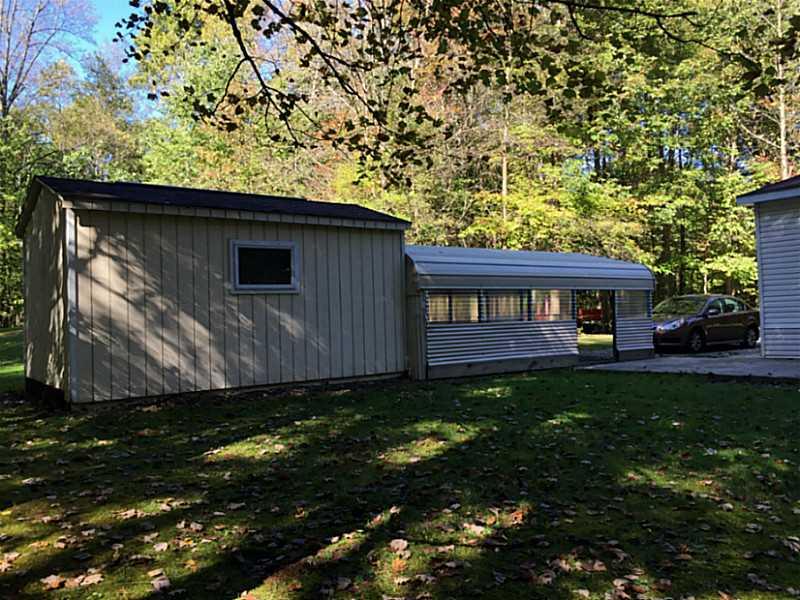 92 Hughes Road Indiana, PA 15701 - Photo 17 of 19 Parking Lot/Garage. Shed/Carport