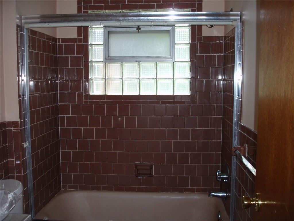 66 Halsey Road Woonsocket, RI 02895 - Photo 11 of 19 Tiled bath with shower.