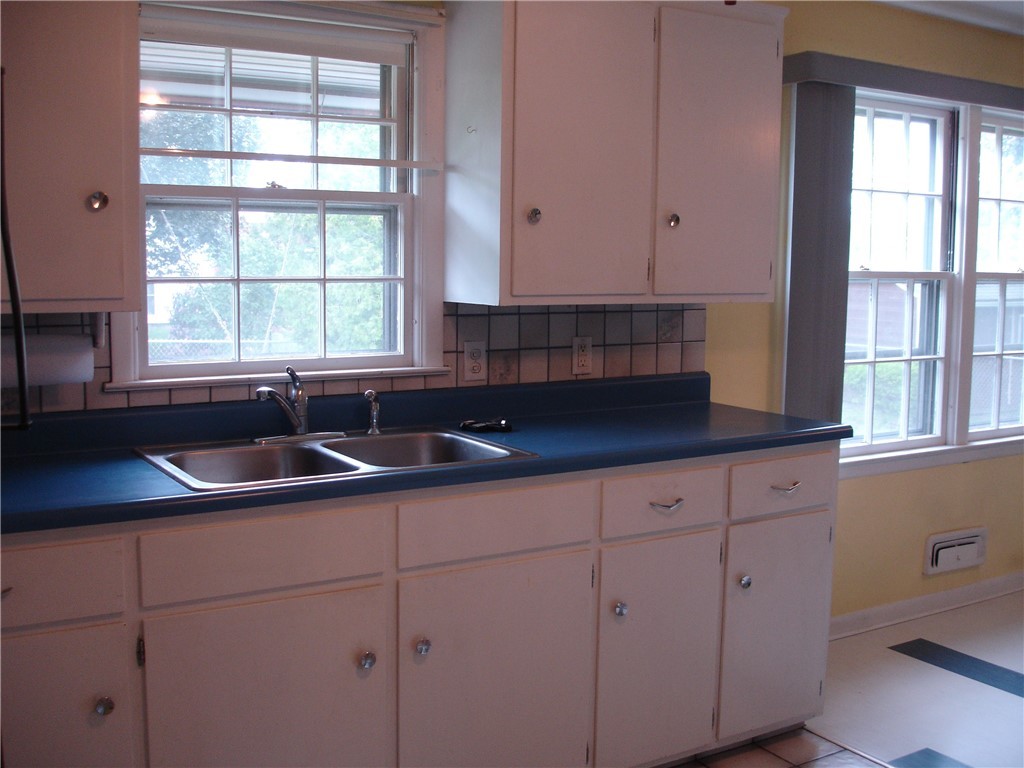 66 Halsey Road Woonsocket, RI 02895 - Photo 4 of 19 Plenty of windows to brighten area. Lots of cabinets