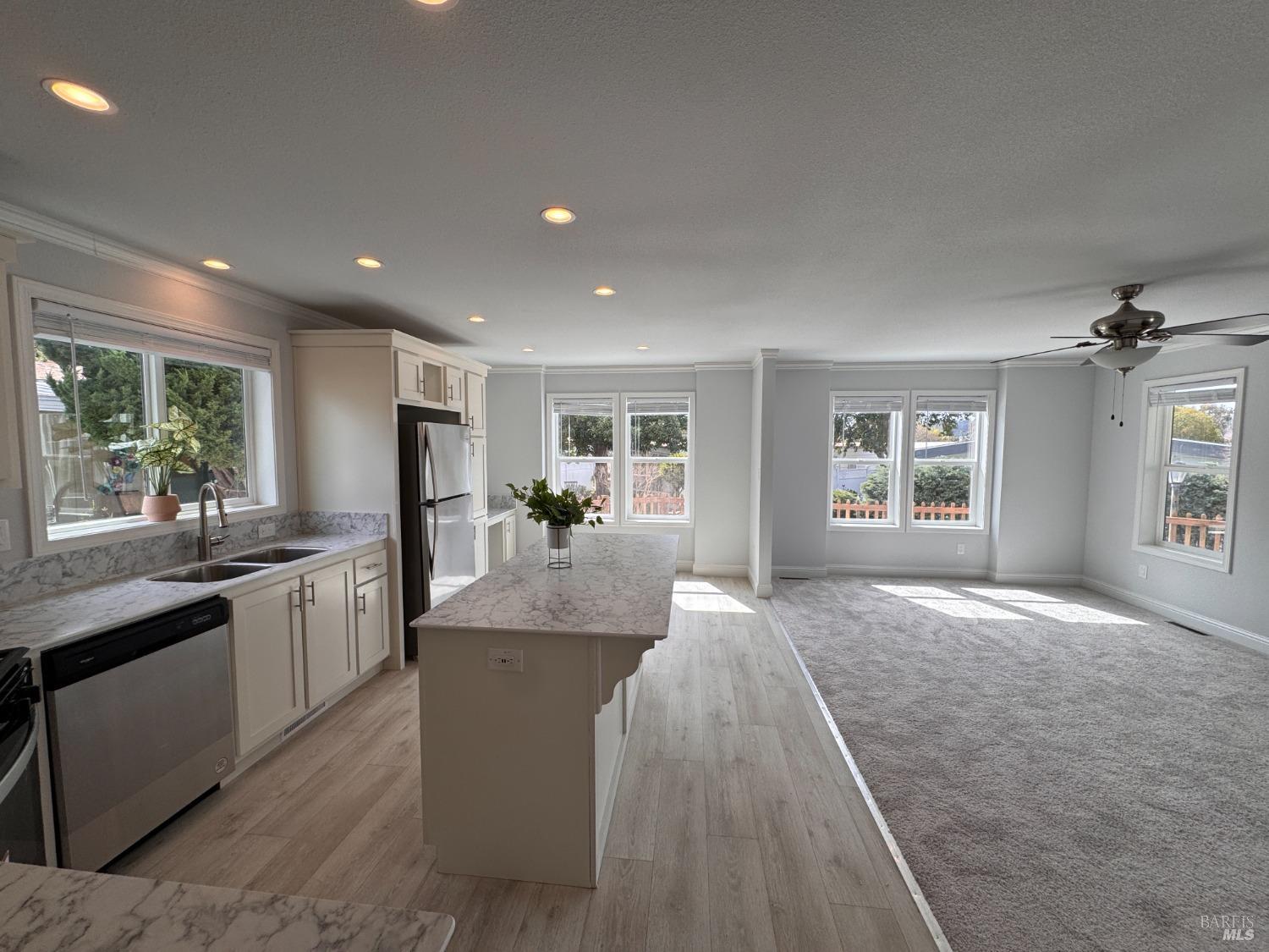 34 Springhill Court Santa Rosa, CA 95409 - Photo 1 of 1 a large kitchen with kitchen island granite countertop a large window