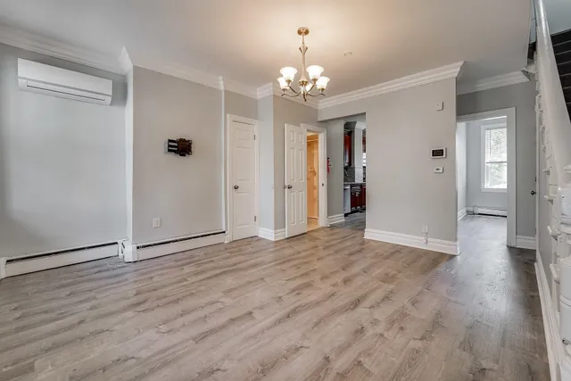 a view of livingroom with hardwood floor and hallway