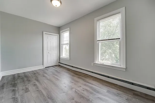 an empty room with windows