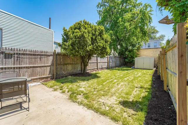 a house view with a backyard space