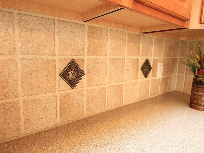 9205 Meadow Mist Court Raleigh, NC 27617 - Photo 10 of 25 note the coins in tile oozes the quality of design Kitchen