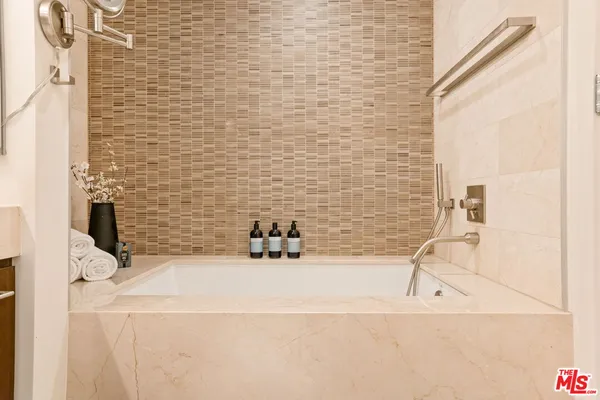 a bathroom with a sink and a bathtub